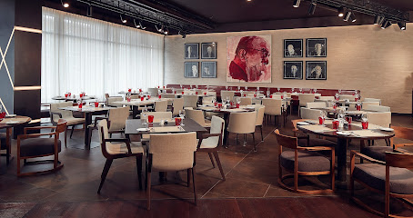 This is Two Kings Restaurant by Hilton's logo