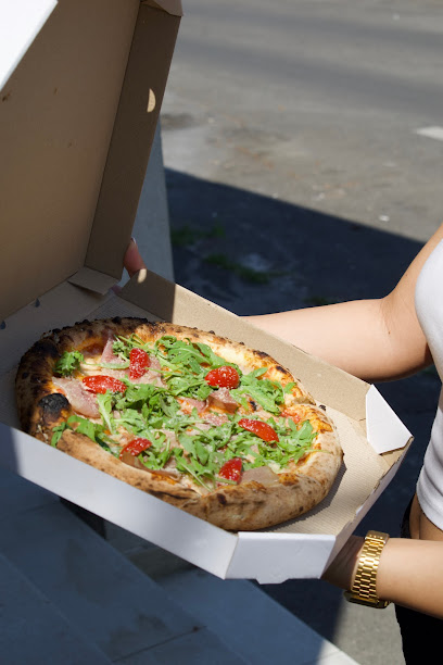 This is Pizza Station Knez's logo
