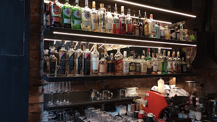 This is Tyman Lounge & Bar's logo
