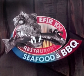 This is Ефир 100 SEAFOOD&BBQ's logo